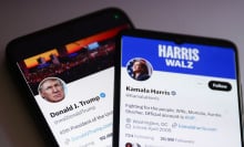 Two phones display the X/Twitter accounts of presidential candidates Donald Trump and Kamala Harris.