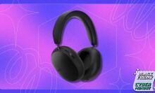 black sonos ace headphones on a purple and pink patterned background