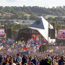 The crowd gathers to watch Elton John perform