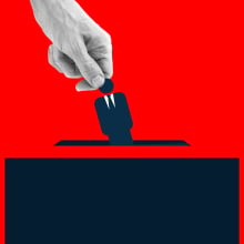 Human hand placing an icon of man wearing suit into the voting box.