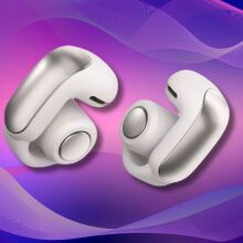 bose ultra open earbuds on a purple and pink wavy background