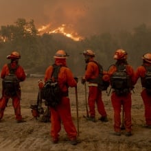 Firefighters battle the Mountain Fire in Moorpark, Calif.