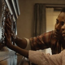 Skylar Smith and John David Washington in "The Piano Lesson."