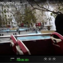 screenshot of a video showing a tour bus going through london