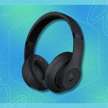 black beats studio 3 headphones on a blue and green patterned background