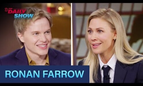 A side by side still of Ronan Farrow and Desi Lydic at the Daily Show news desk.