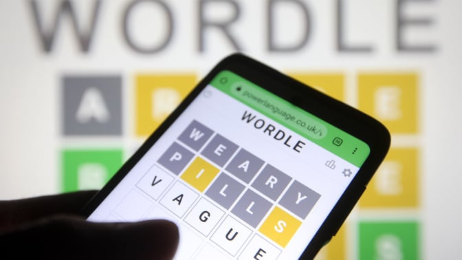 phone displaying wordle game