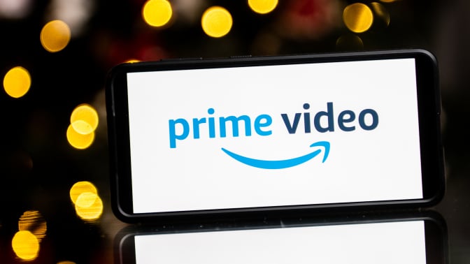 In this photo illustration a Prime Video logo seen displayed on a smartphone