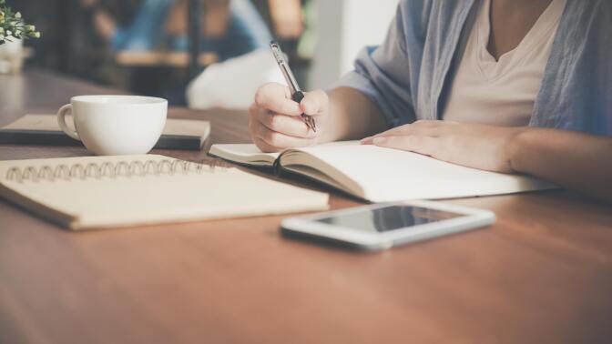 Girl writing notes