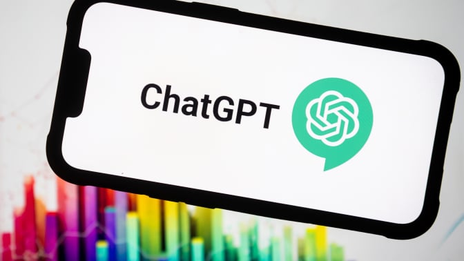 In this photo illustration, the Chat GPT logo seen displayed on a smartphone