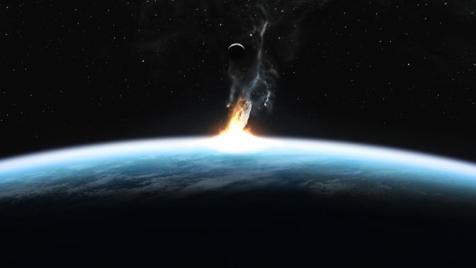 An artist's conception of a large space rock colliding with Earth.