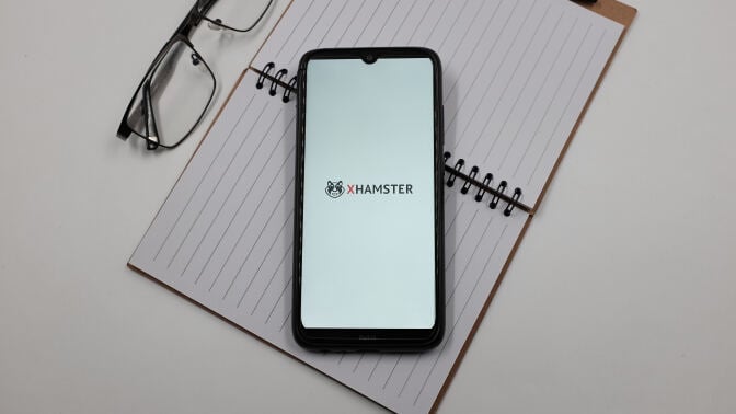 In this photo illustration a xHamster logo is displayed on a smartphone screen