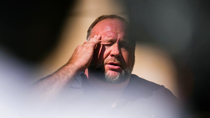 alex jones rubbing his temples