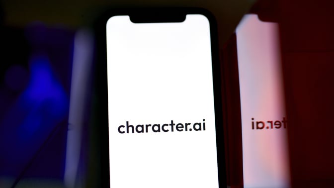 A phone screen showing the Character.AI logo.