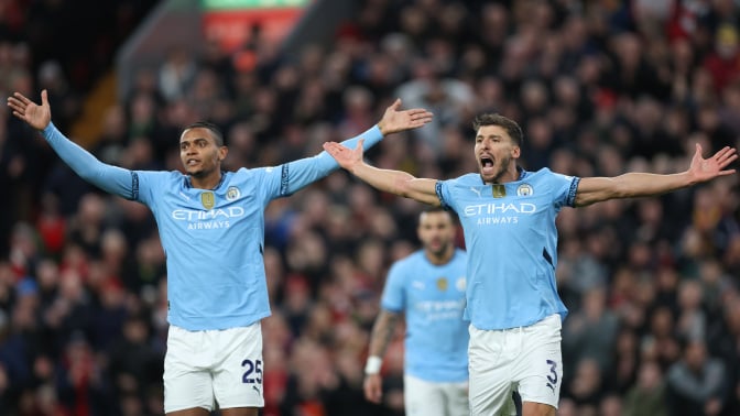 Manuel Akanji and Ruben Dias of Manchester City react