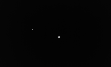 Earth and the moon as viewed by the European Space Agency's Hera mission. 