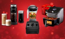 A collage of four popular kitchen appliances on a festive red background with sparkling lights. The appliances featured are a Keurig coffee maker, a Vitamix blender, an Instant Pot air fryer.