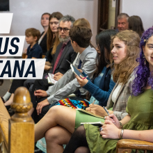 Photograph depicts young people sat in court for the Held v Montana trial. Caption reads "Held versus Montana"