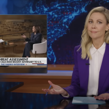 The Daily Show host Desi Lydic presents a segment beside an image of Kamala Harris being interviewed by Fox News Bret Baier.