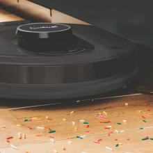 Shark AI ultra robot vacuum vacuuming colorful sprinkles 