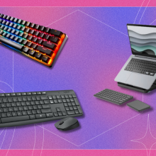 Various keyboards in front of a purple background