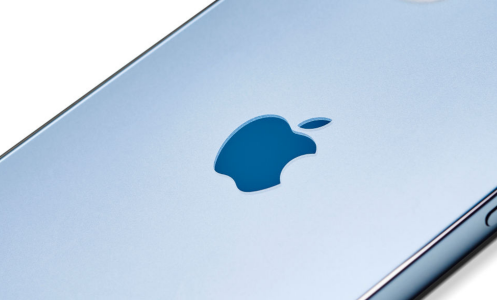 A close up of the logo on an Apple iPhone 12 Pro with a Pacific Blue finish.