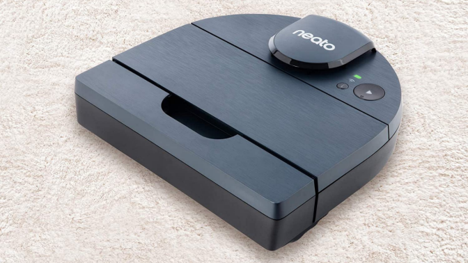 D-shaped robot vacuum on carpet