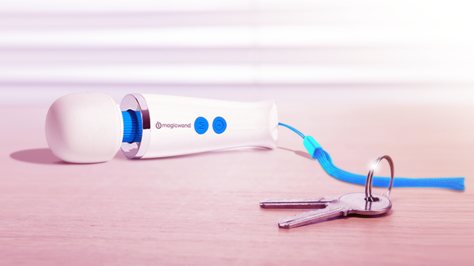 micro magic wand next to a pair of keys