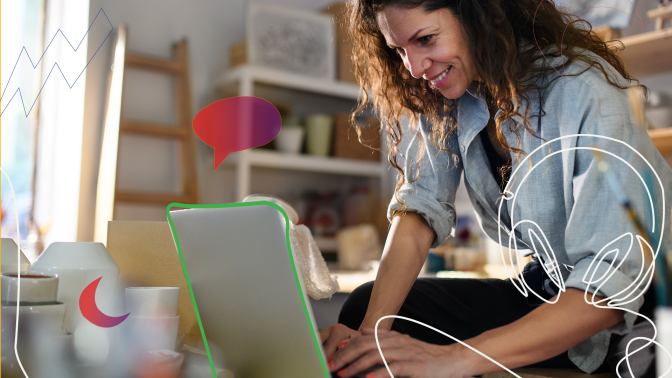 A woman using a laptop.