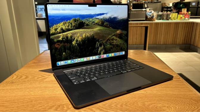 a 15-inch m3 apple macbook air on a table in a starbucks